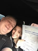 After bolton driving lessons Rachels shows off her pass certificate